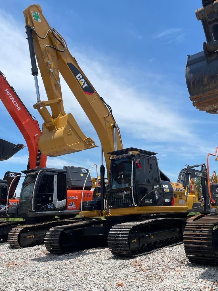 CAT 323 Telakaivukoneet