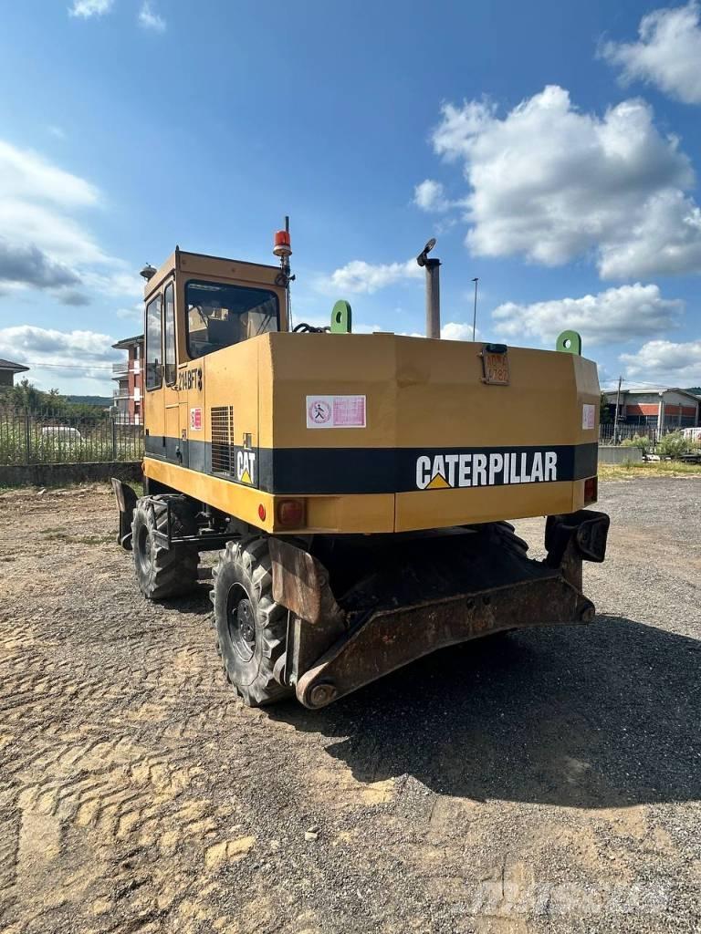 CAT 214 Pyöräkaivukoneet