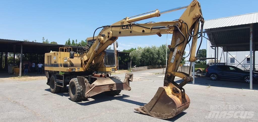 CAT 214 B Pyöräkaivukoneet