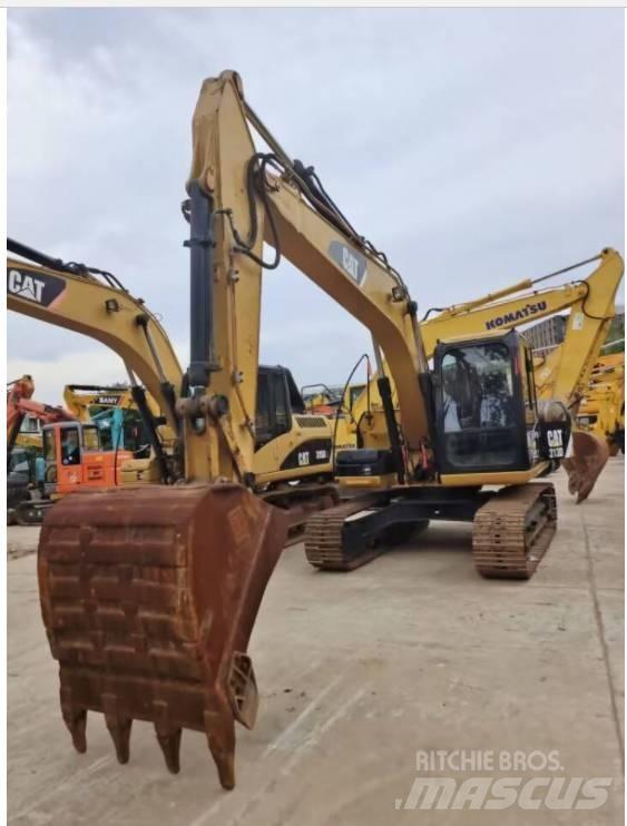 CAT 313 D Telakaivukoneet
