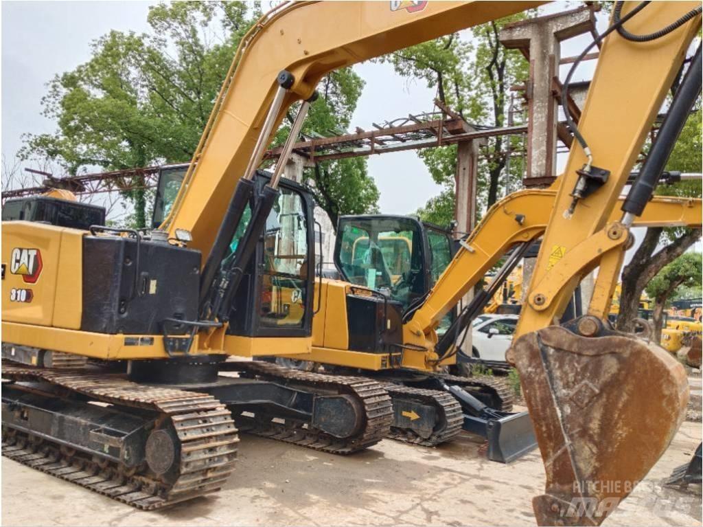 CAT 310 Telakaivukoneet