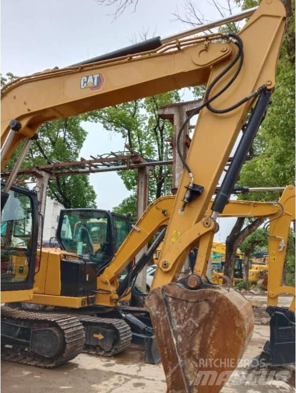 CAT 310 Telakaivukoneet