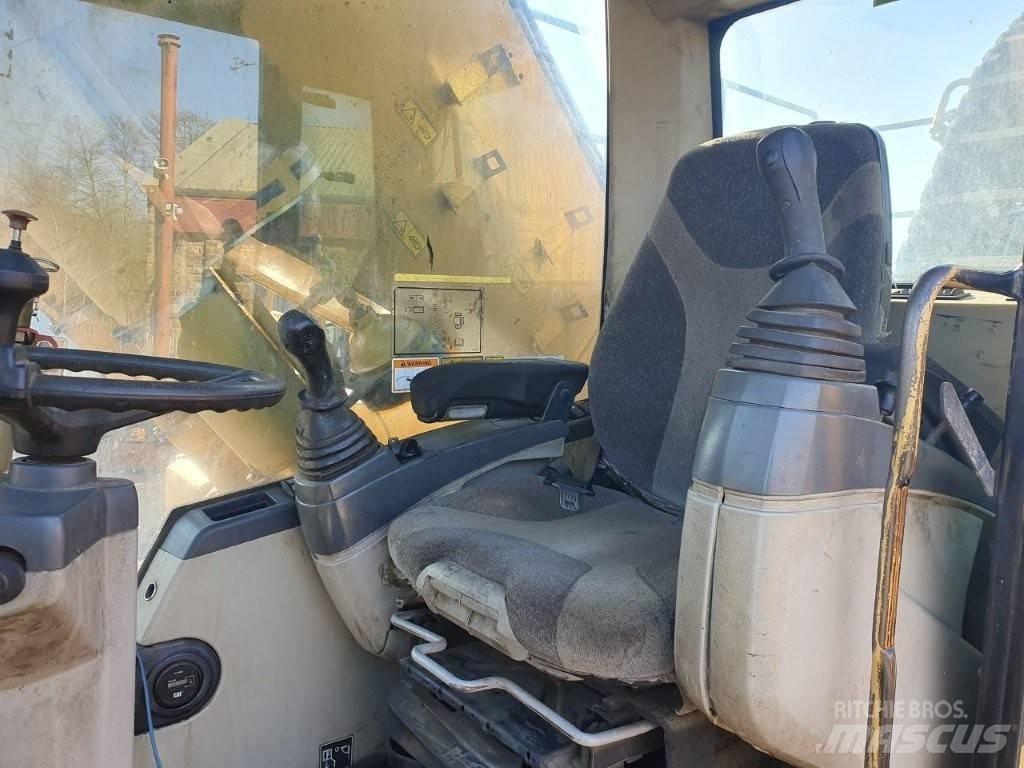 CAT M 325 C MH Jätteenkäsittelijät