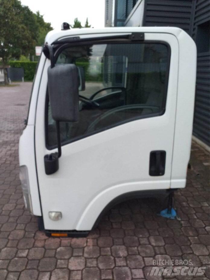 Isuzu M - L Ohjaamot ja sisustat