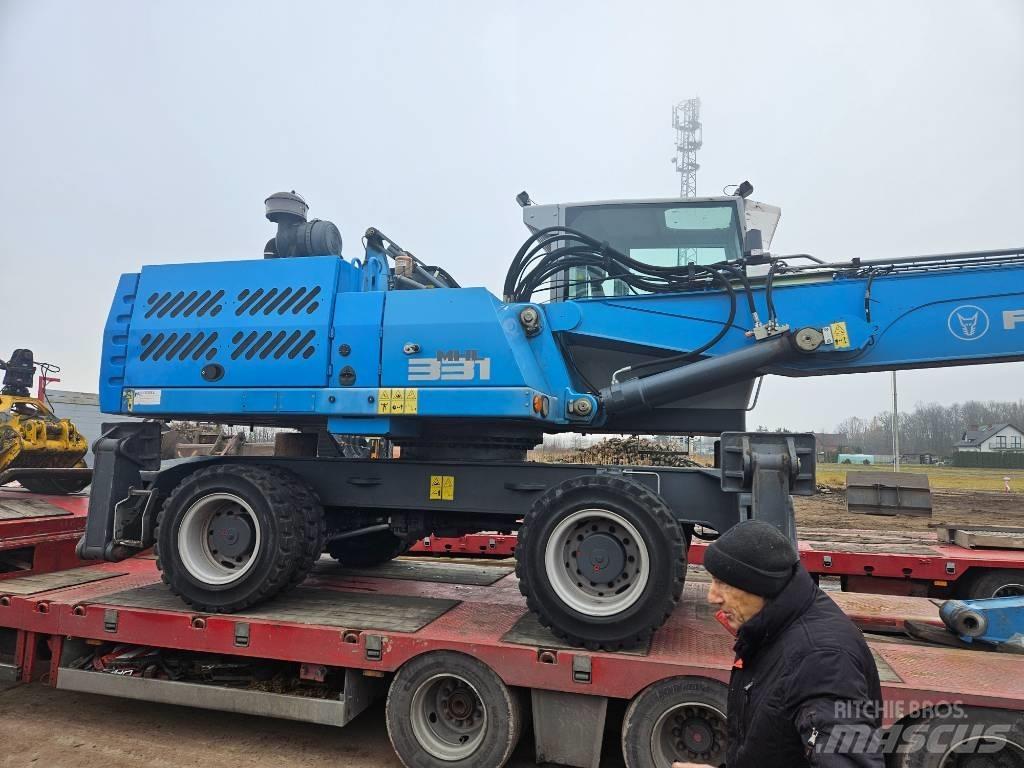 Fuchs MHL 331 Jätteenkäsittelijät