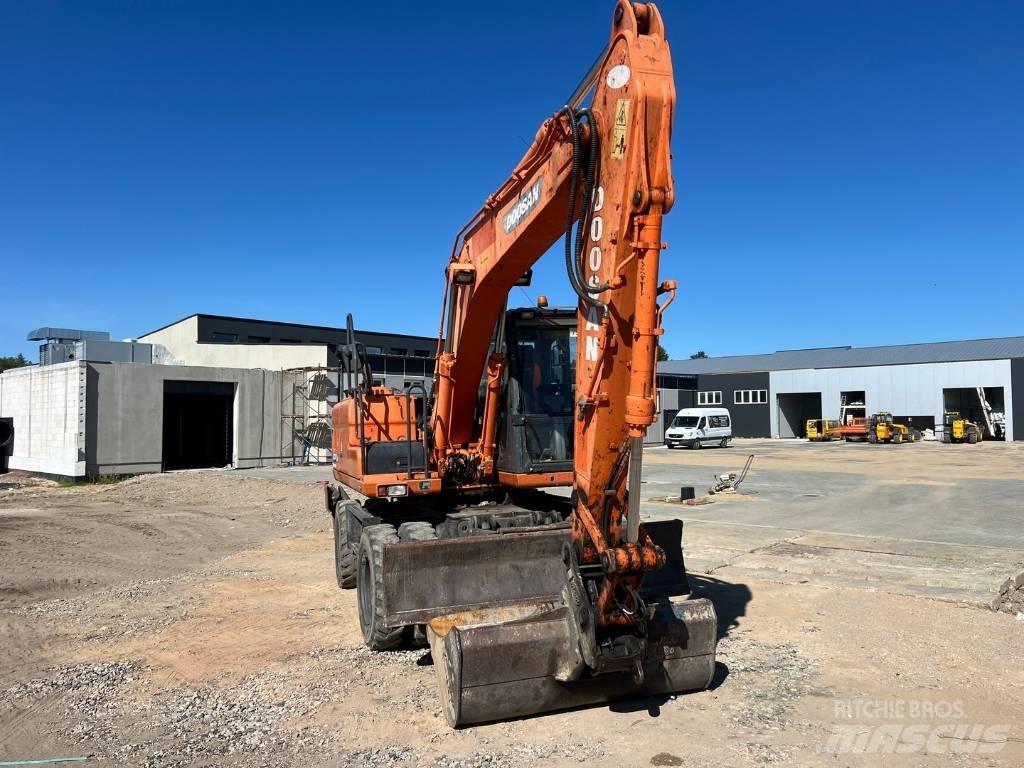 Doosan DX 140 W Pyöräkaivukoneet