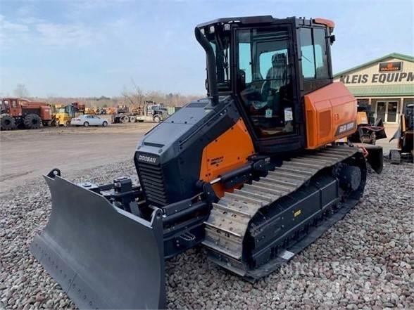 Develon DD100 Telaketjupuskutraktorit