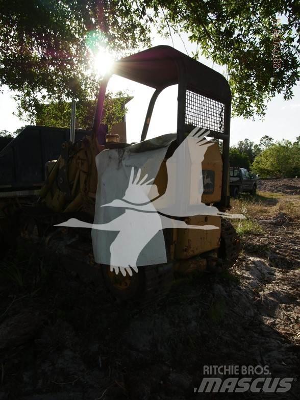 John Deere 450 Telakuormaajat
