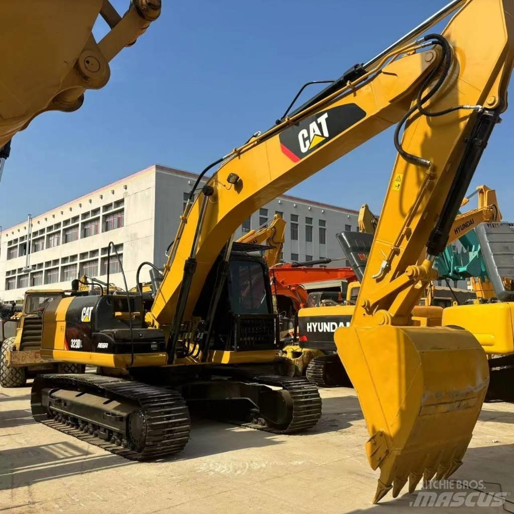 CAT 323 D L Telakaivukoneet