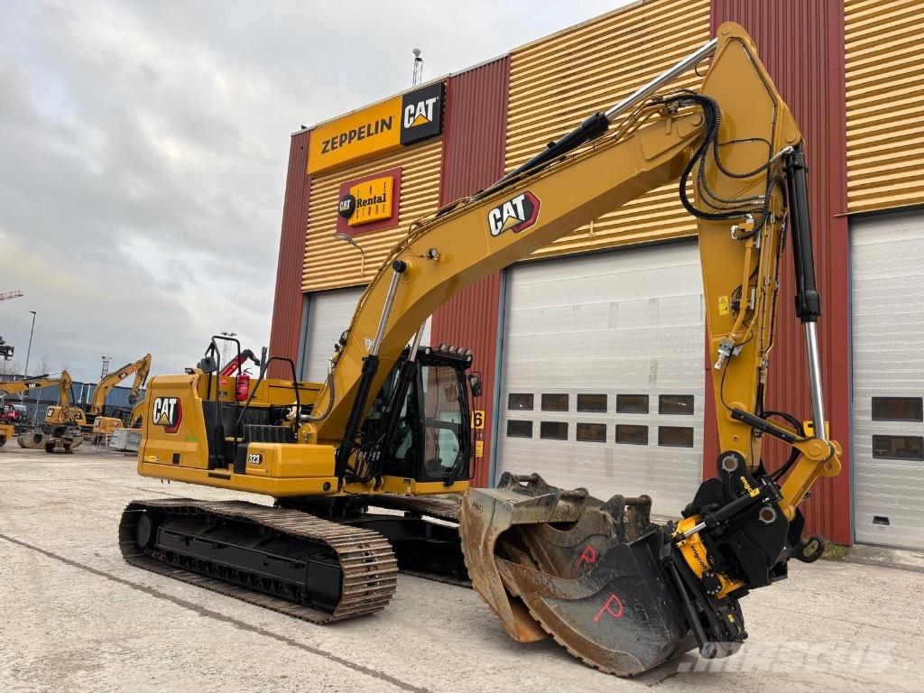 CAT 323 Telakaivukoneet