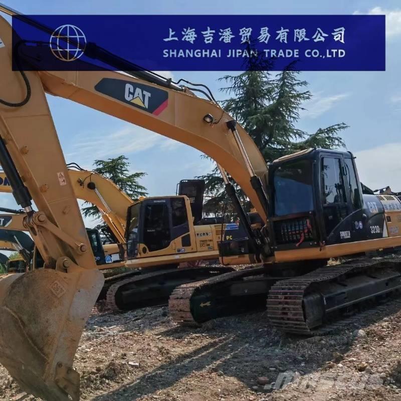 CAT 323 Telakaivukoneet