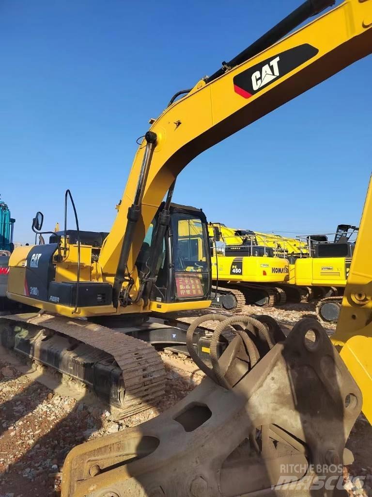 CAT 318 Telakaivukoneet