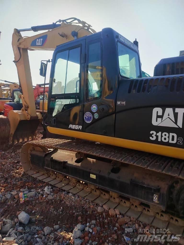 CAT 318 Telakaivukoneet