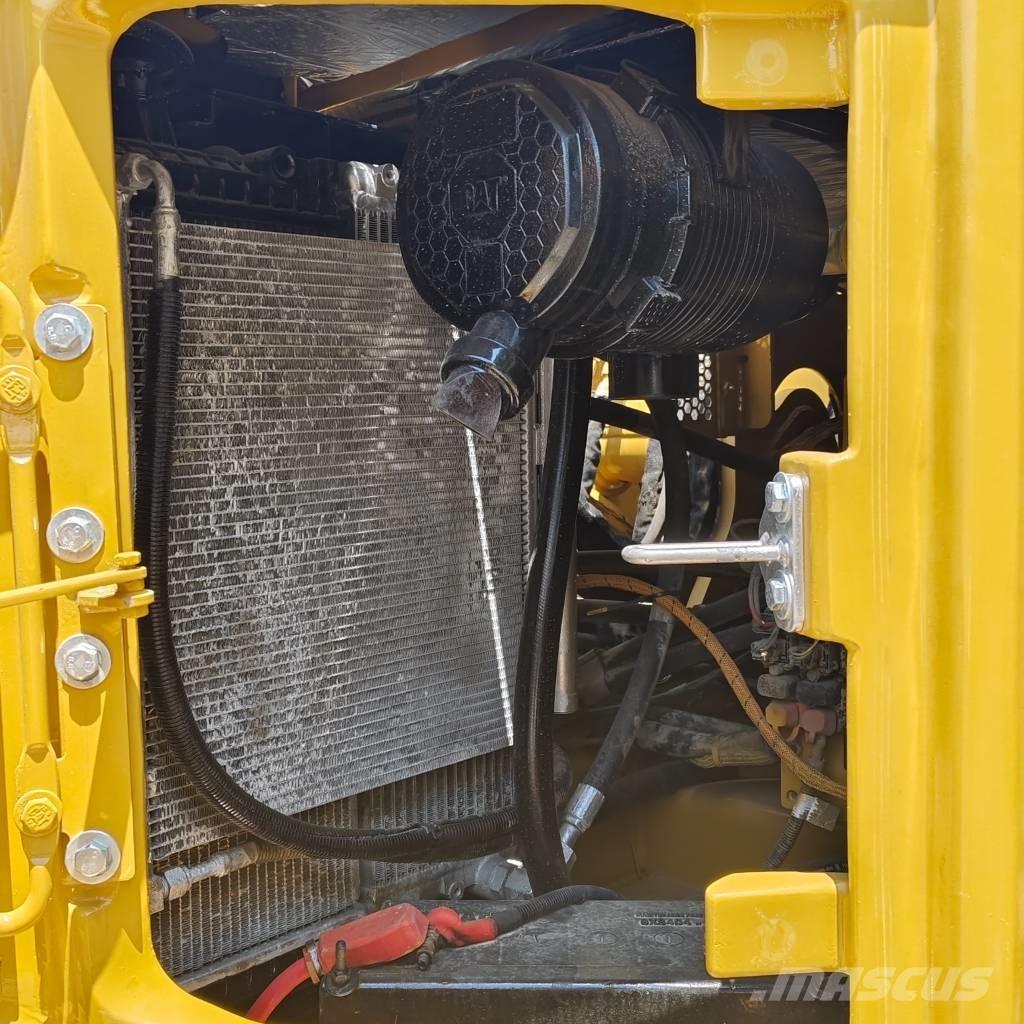 CAT 310 Telakaivukoneet