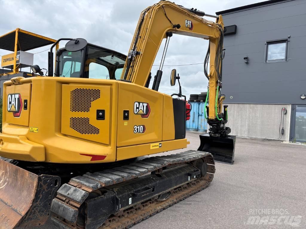 CAT 310 Telakaivukoneet