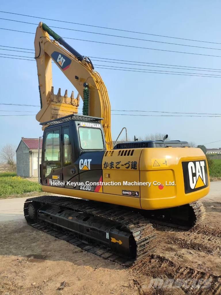 CAT 323 Telakaivukoneet
