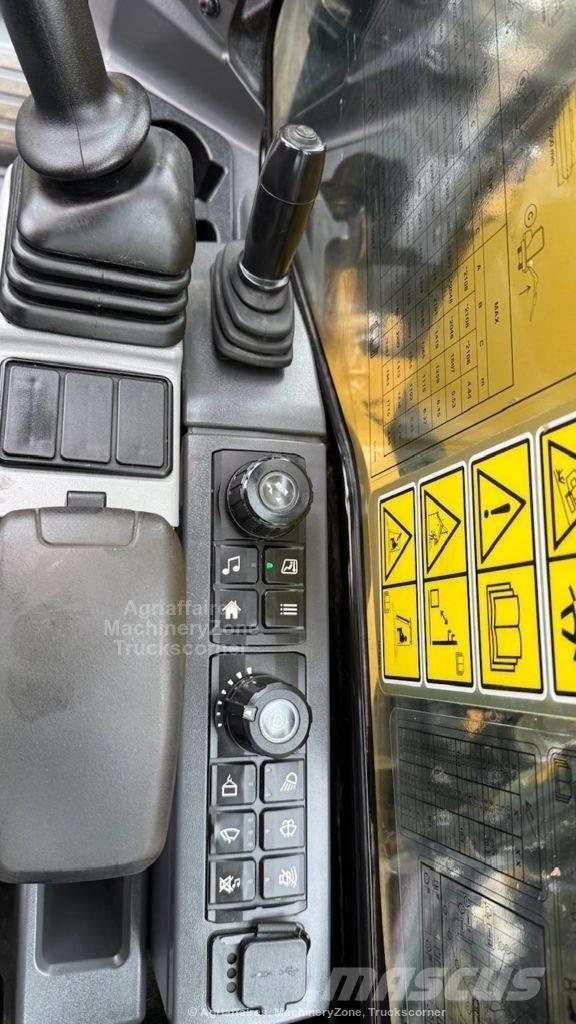 CAT 310 Telakaivukoneet