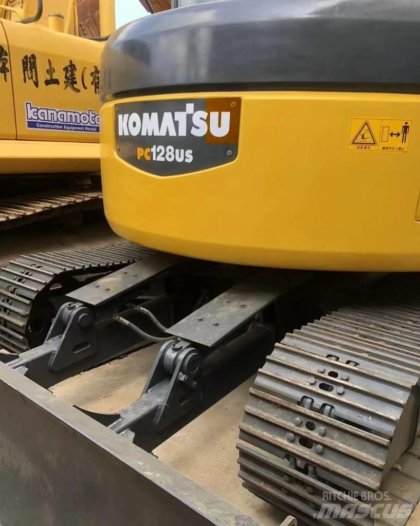 Komatsu 128 US Telakaivukoneet