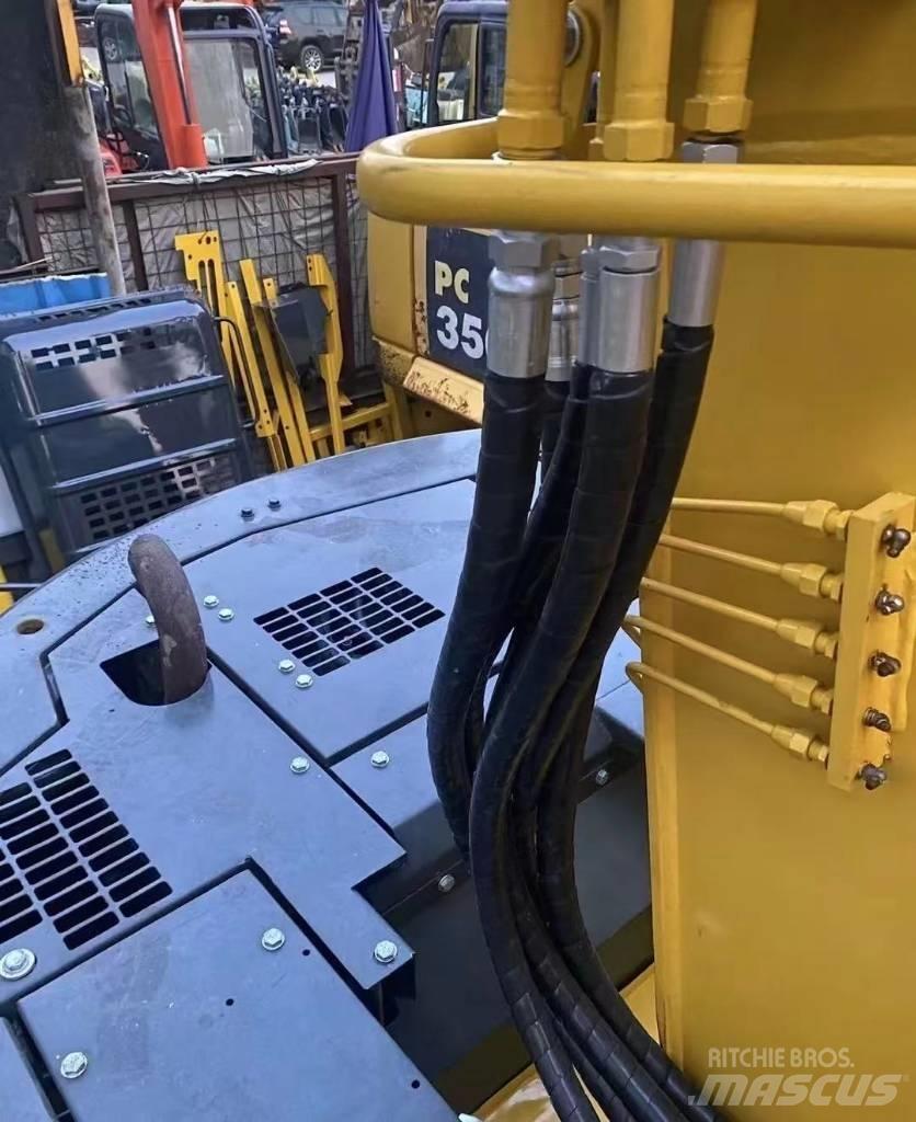 Komatsu 128 US Telakaivukoneet
