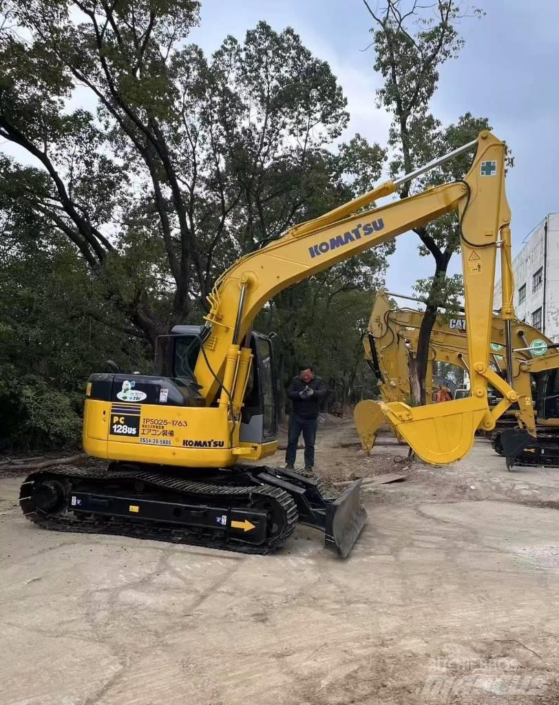 Komatsu 128 US Telakaivukoneet