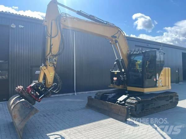 CAT 310 Telakaivukoneet