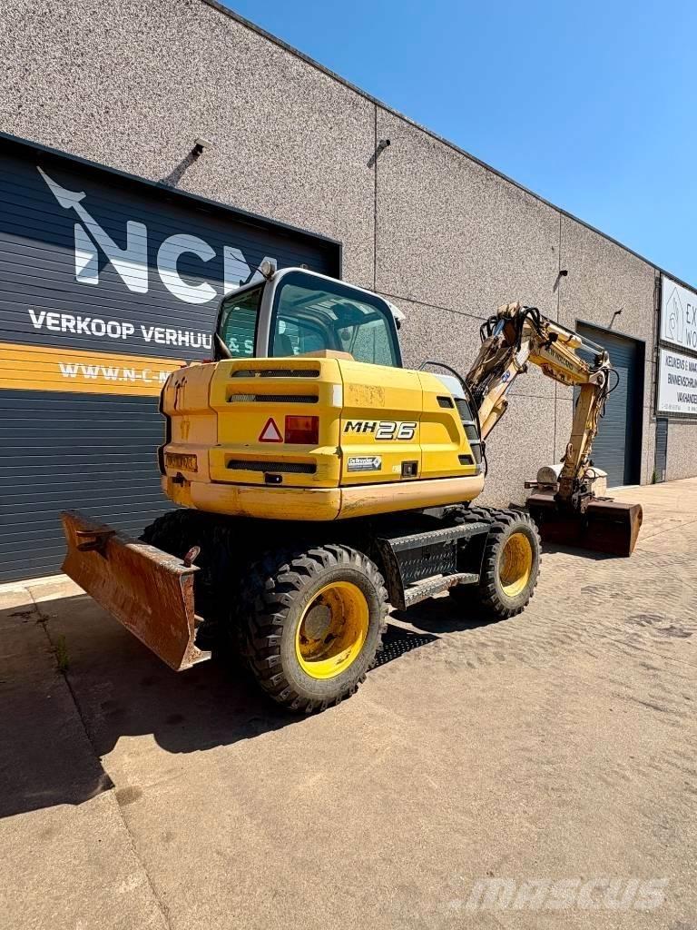 New Holland MH 2.6 Pyöräkaivukoneet