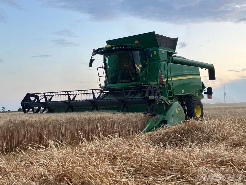John Deere T 670 i Leikkuupuimurit