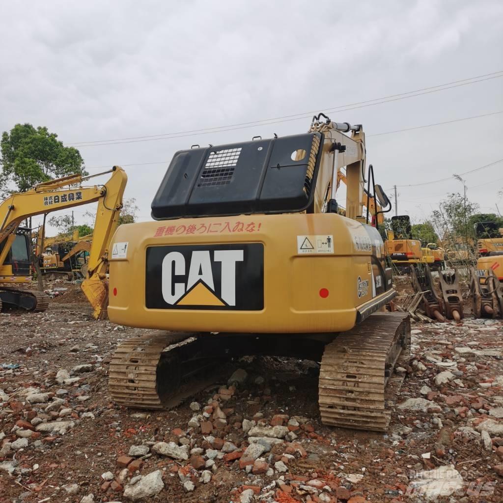 CAT 323DL Telakaivukoneet