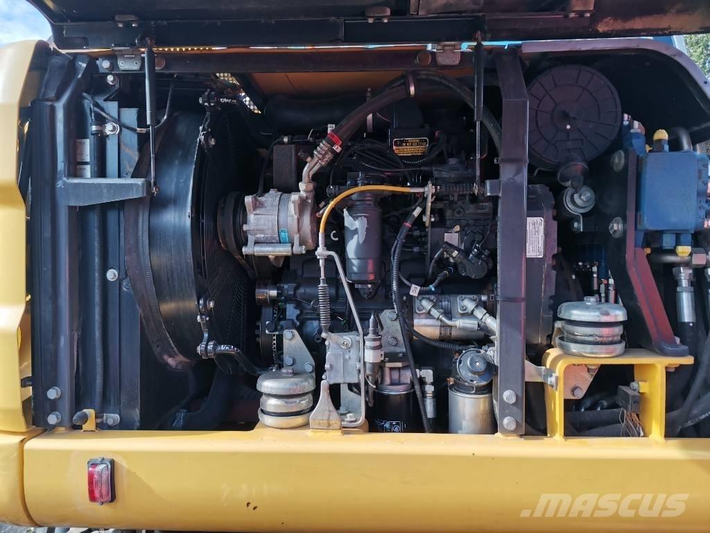 New Holland MH 2.6 Pyöräkaivukoneet