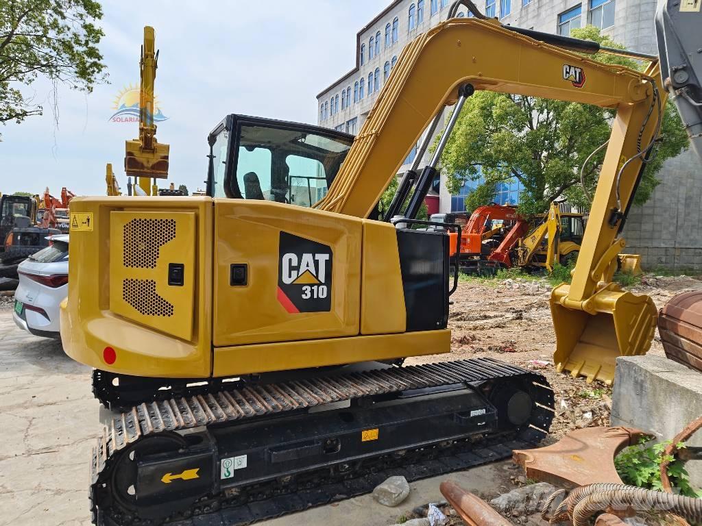 CAT 310 Telakaivukoneet