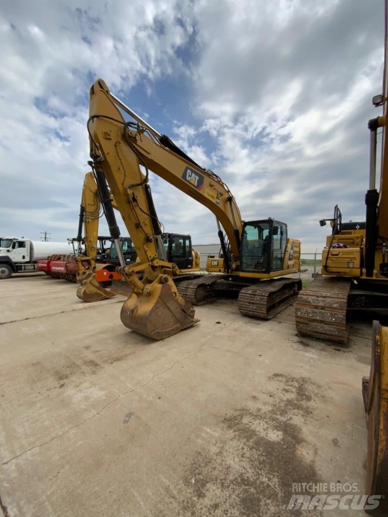 CAT 323 Telakaivukoneet