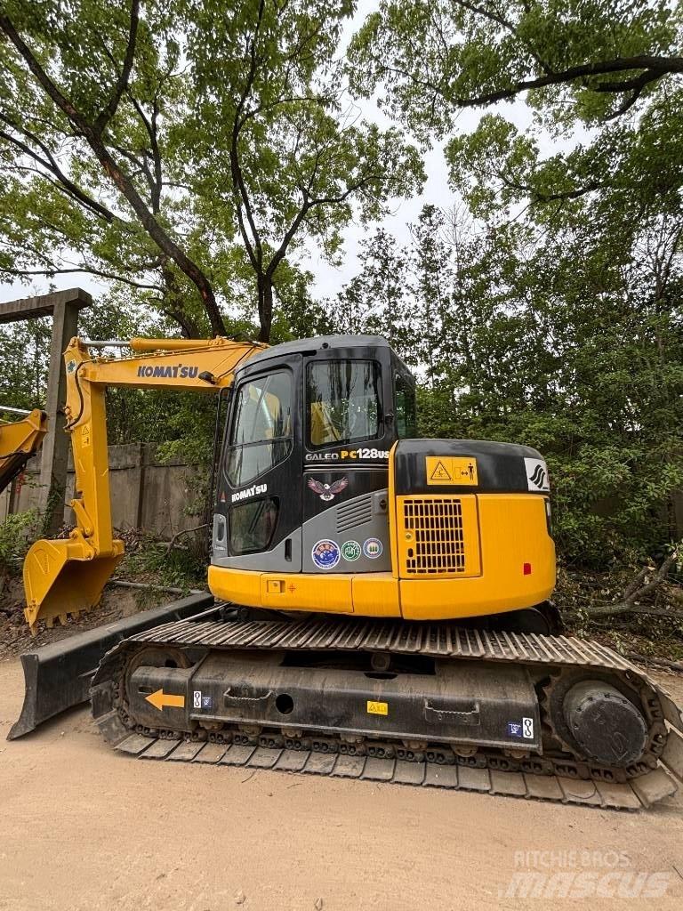 CAT pc 128us Midikaivukoneet 7t - 12t