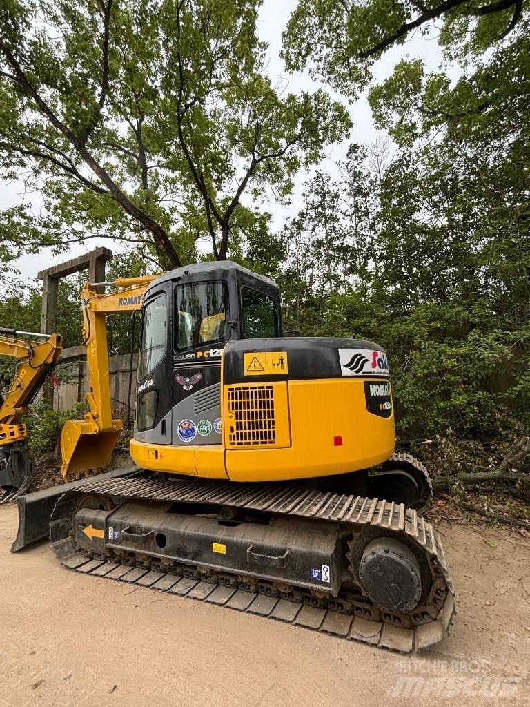 CAT pc 128us Midikaivukoneet 7t - 12t