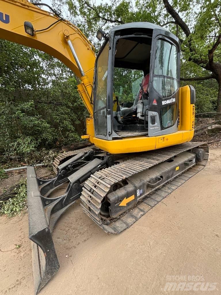 CAT pc 128us Midikaivukoneet 7t - 12t