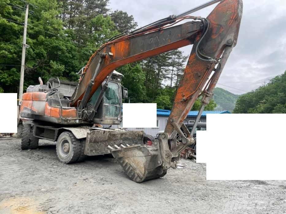 Doosan DX 210 W Pyöräkaivukoneet