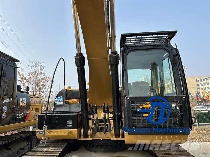 CAT 323D/323/323DL Telakaivukoneet