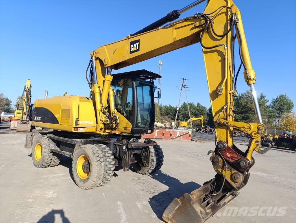 CAT M 318 C Pyöräkaivukoneet