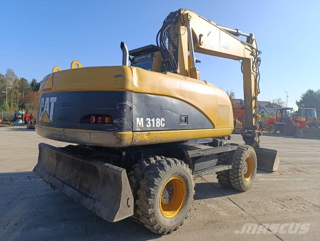 CAT M 318 C Pyöräkaivukoneet