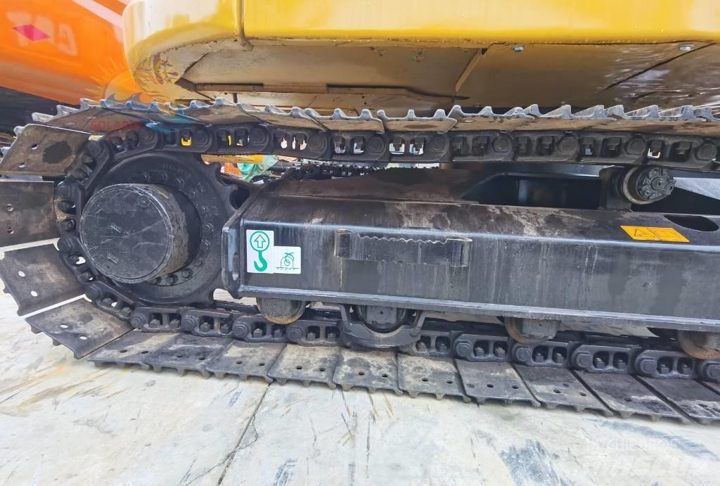 CAT 310 Telakaivukoneet