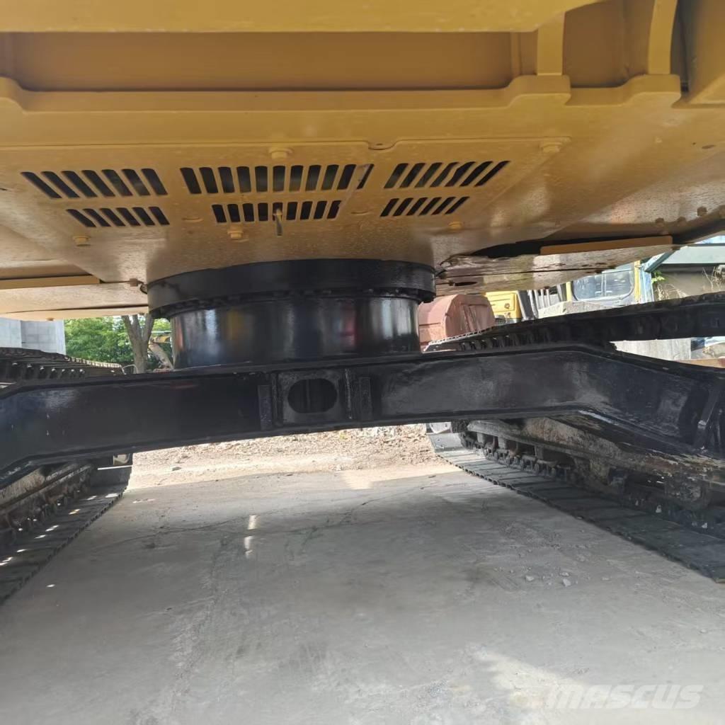 CAT 310 Telakaivukoneet