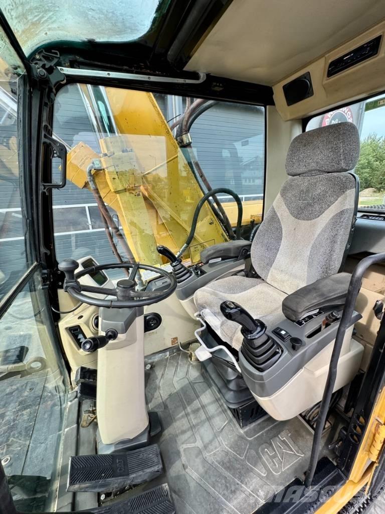 CAT M 318 C Pyöräkaivukoneet