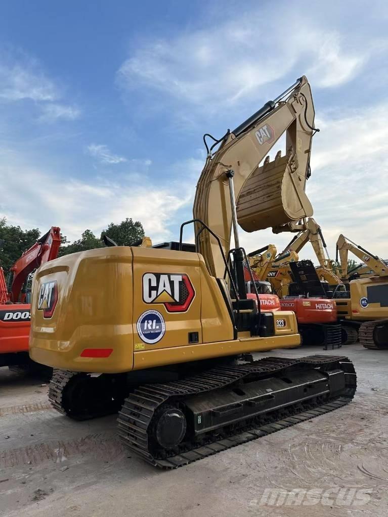 CAT 323 Telakaivukoneet