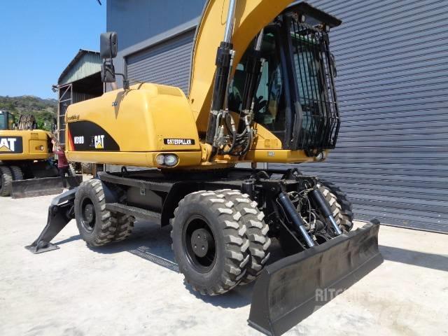 CAT M 318 D Pyöräkaivukoneet