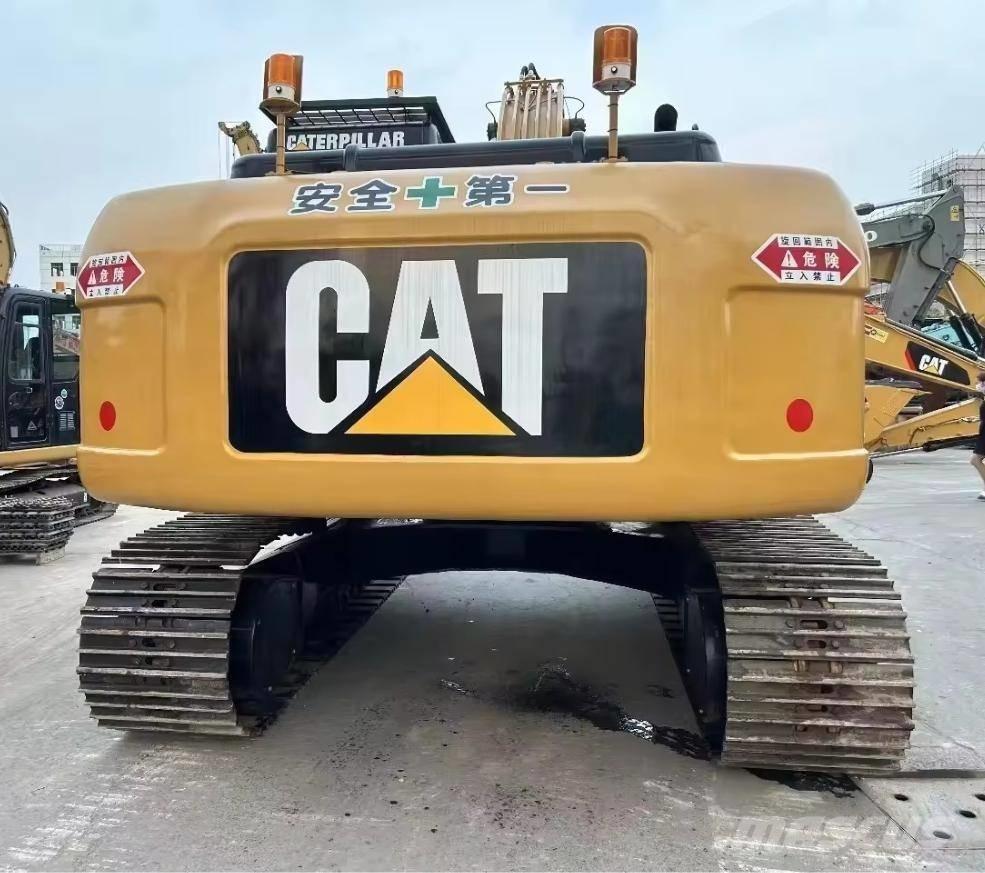 CAT 323 D Telakaivukoneet