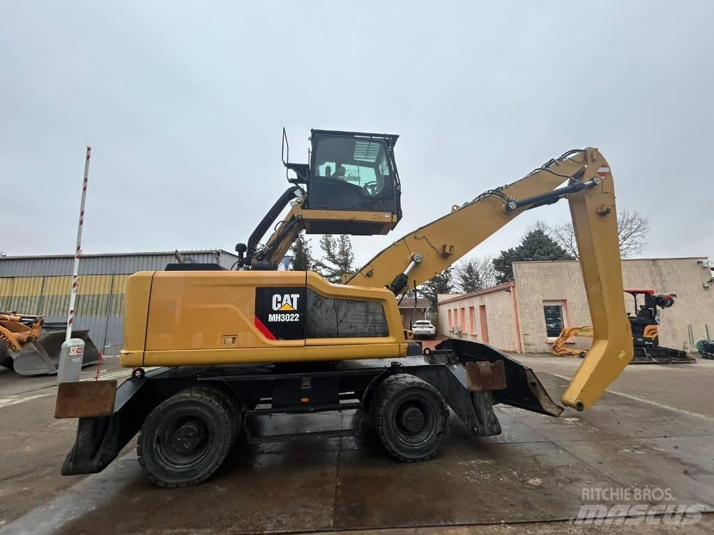 CAT MH3022 Pyöräkaivukoneet