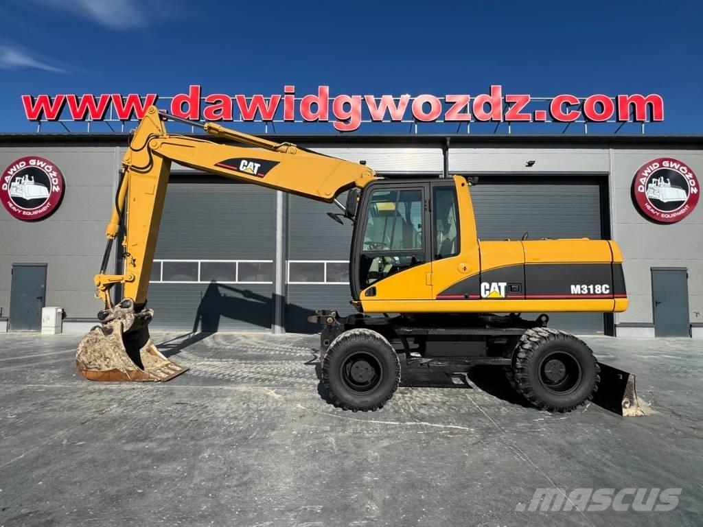 CAT M 318 C Pyöräkaivukoneet