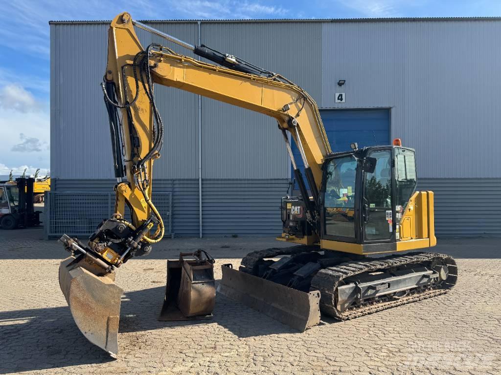 CAT 310 Telakaivukoneet