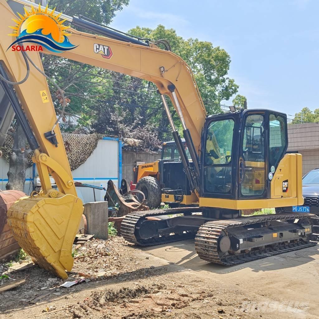 CAT 310 Telakaivukoneet