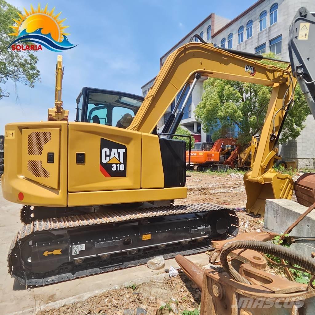 CAT 310 Telakaivukoneet