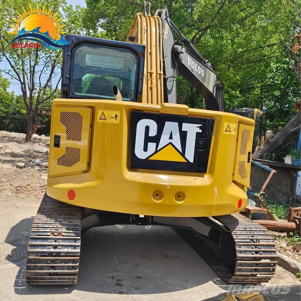 CAT 310 Telakaivukoneet